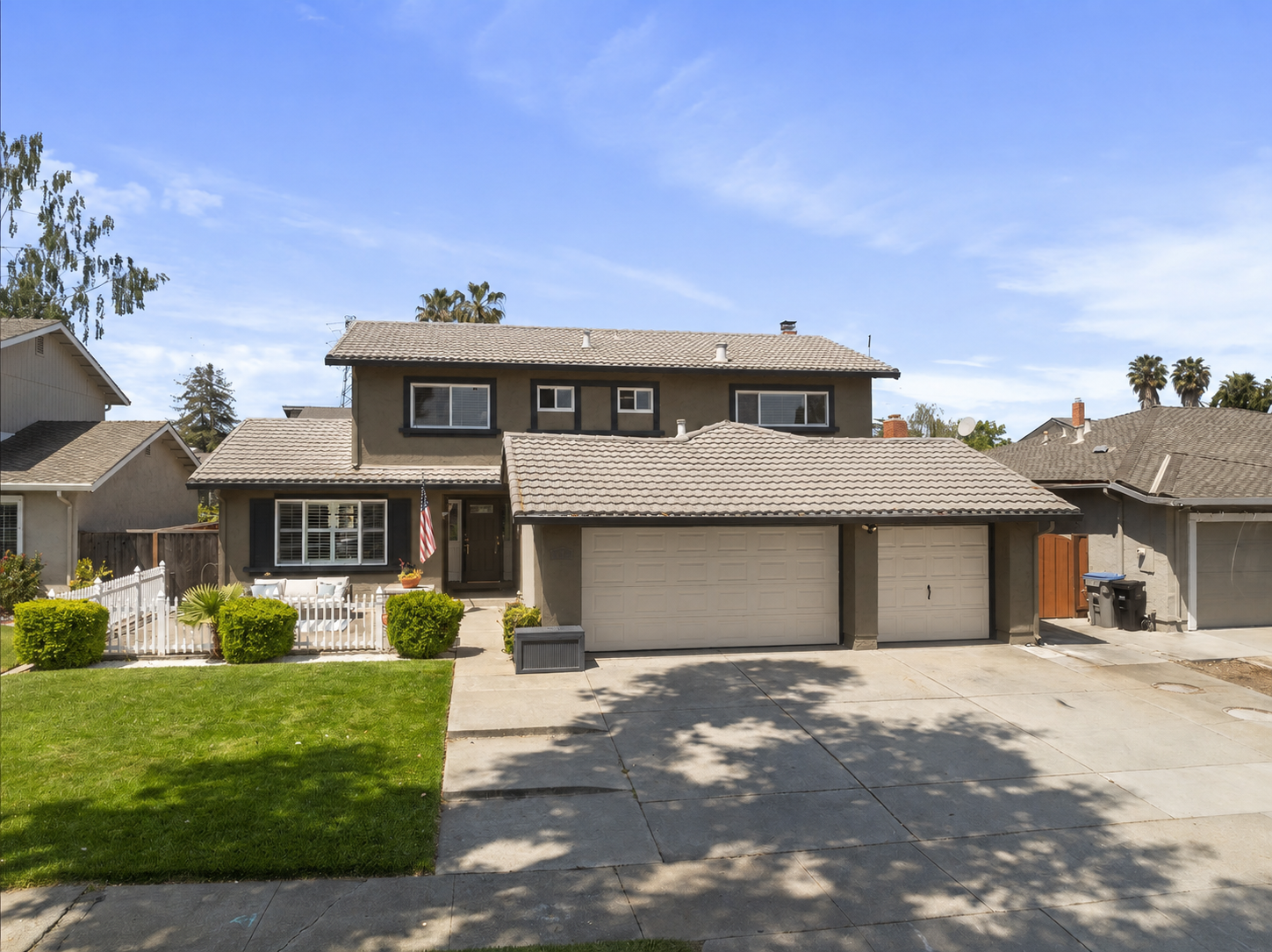 Mushroom greige exterior paint mockup with black trim